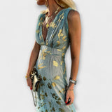 Elegant dress with V-neckline and sequin detail
