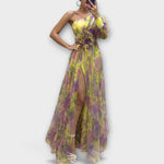 Elegant evening dress with one shoulder strap and tailored cut