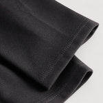 Kate | Refined black dress with belt and mandarin collar